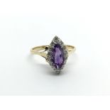 An 18carat Amethyst ring set with diamonds and a g