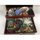 A box of costume jewellery.