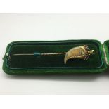 A cased Victorian Indian gold stick pin in the for