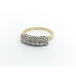 A 18carat gold ring set with two rows of brilliant