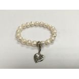 A Thomas Sabo charm club pearl bracelet.