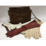 A vintage snakeskin handbag and six pairs of vinta