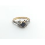 An 18carat gold ring set with a sapphire the shank