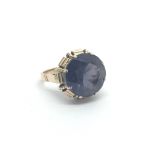 An unmarked gold ring possible 14carat set with a round cut alexandrite. ring size K.