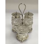 A silver three piece cruet set, Sheffield hallmark