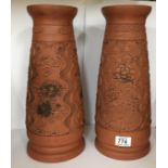 A large pair of Japanese Tokoname red clay pottery vases with impressed mark to base, H.38cm