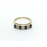 A 9carat gold ring set with blue sapphire and diam