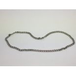 An antique sterling silver necklace chain.