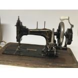 A Vintage Frister & Rossman sewing machine in a fi
