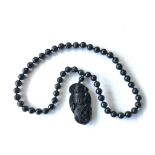 An Obsidian Quan Yin prayer necklace