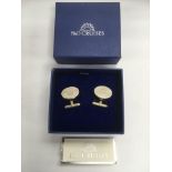 A pair of silver P&O cufflinks in original box.