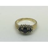 An 18ct gold sapphire and diamond ring, approx 4.2