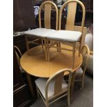 A modern Circular dining table with 6 Chairs and 1 additional leaf - NO RESERVE