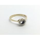 An 18carat gold ring set with heart shaped pattern of diamonds ring size M.