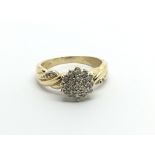 An 18carat gold ring set with a pattern of brillia