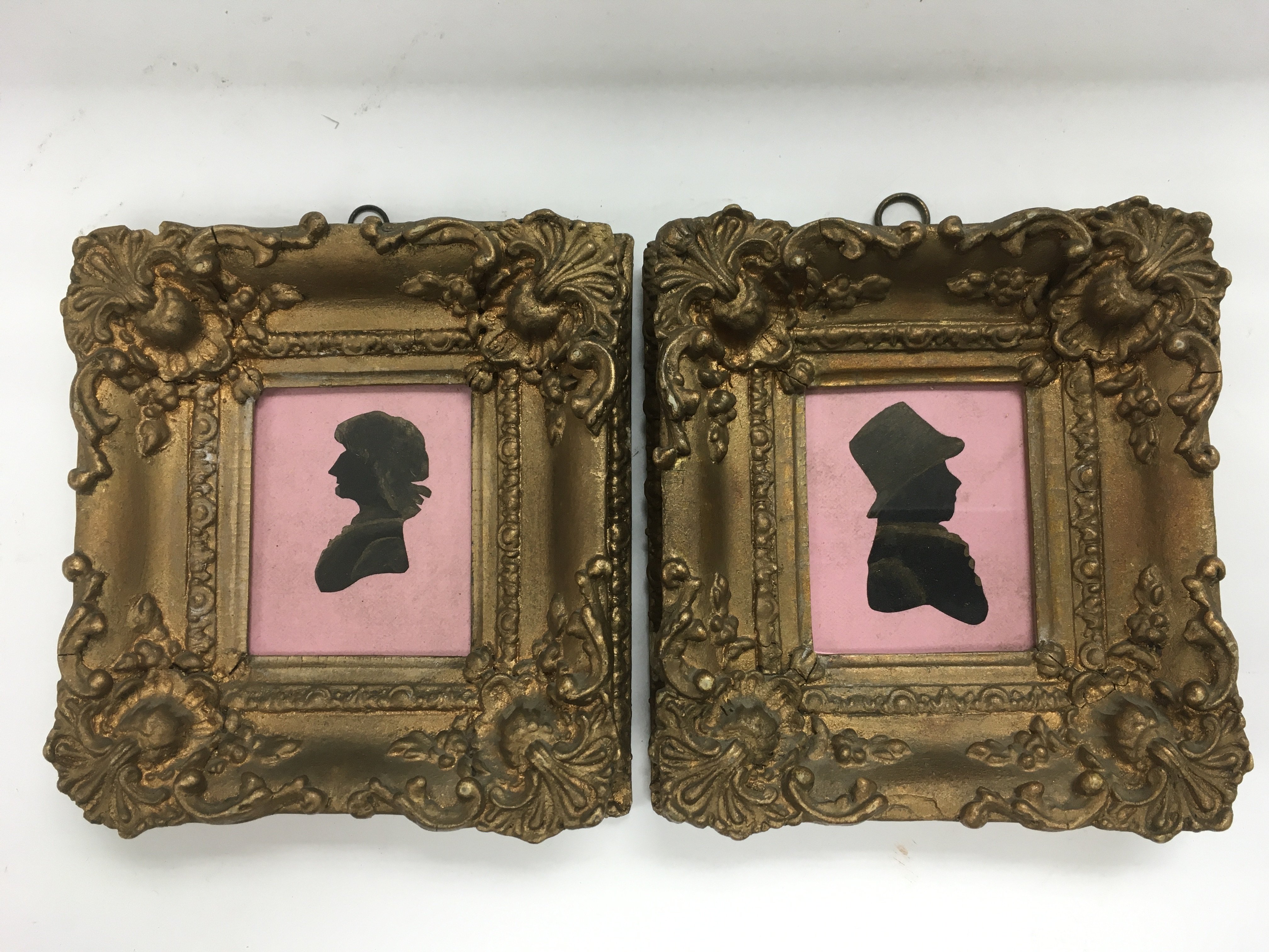 A pair of gilt framed Victorian silhouettes, appro