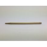 An 18ct gold Cartier pencil set with a cabochon sa