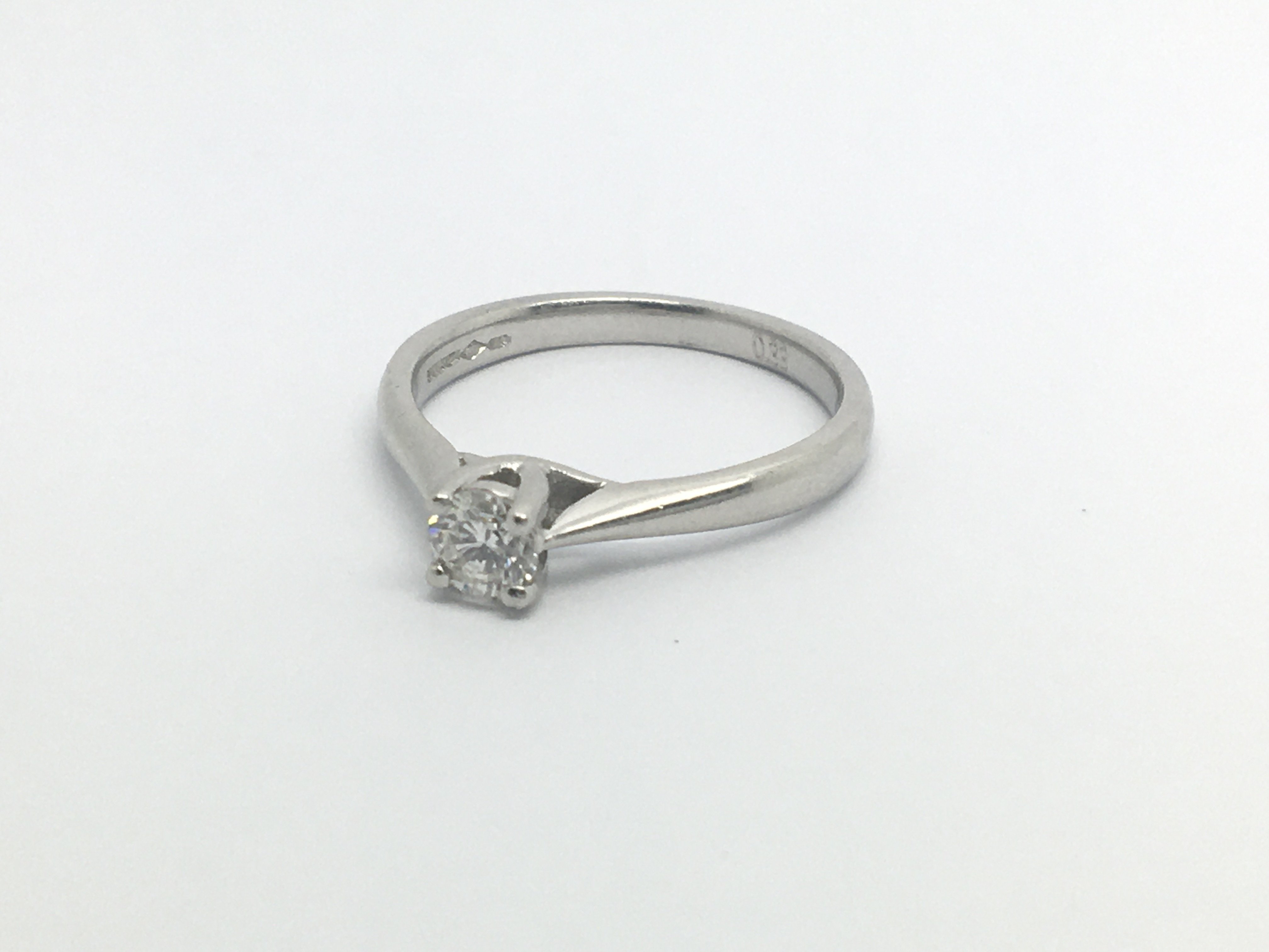 An 18carat white gold ring set with a solitaire di