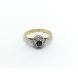An 18carat gold and platinum ring set with a sapph