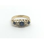 A Vintage 18carat gold ring set with three sapphir