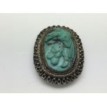 A vintage Chinese silver and turquoise clip brooch