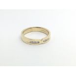 An 18carat gold ring set with six brilliant cut di