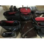 A collection of binoculars including Zenith .