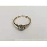 A Small 9 ct gold Diamond cluster ring size 0.