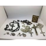 A collection of Catholic religious items comprisin