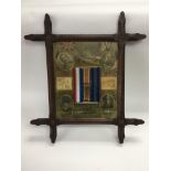 A framed and glazed WW1 commemorative picture disp
