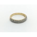 An 18 carat gold ring half hoop eternity ring set