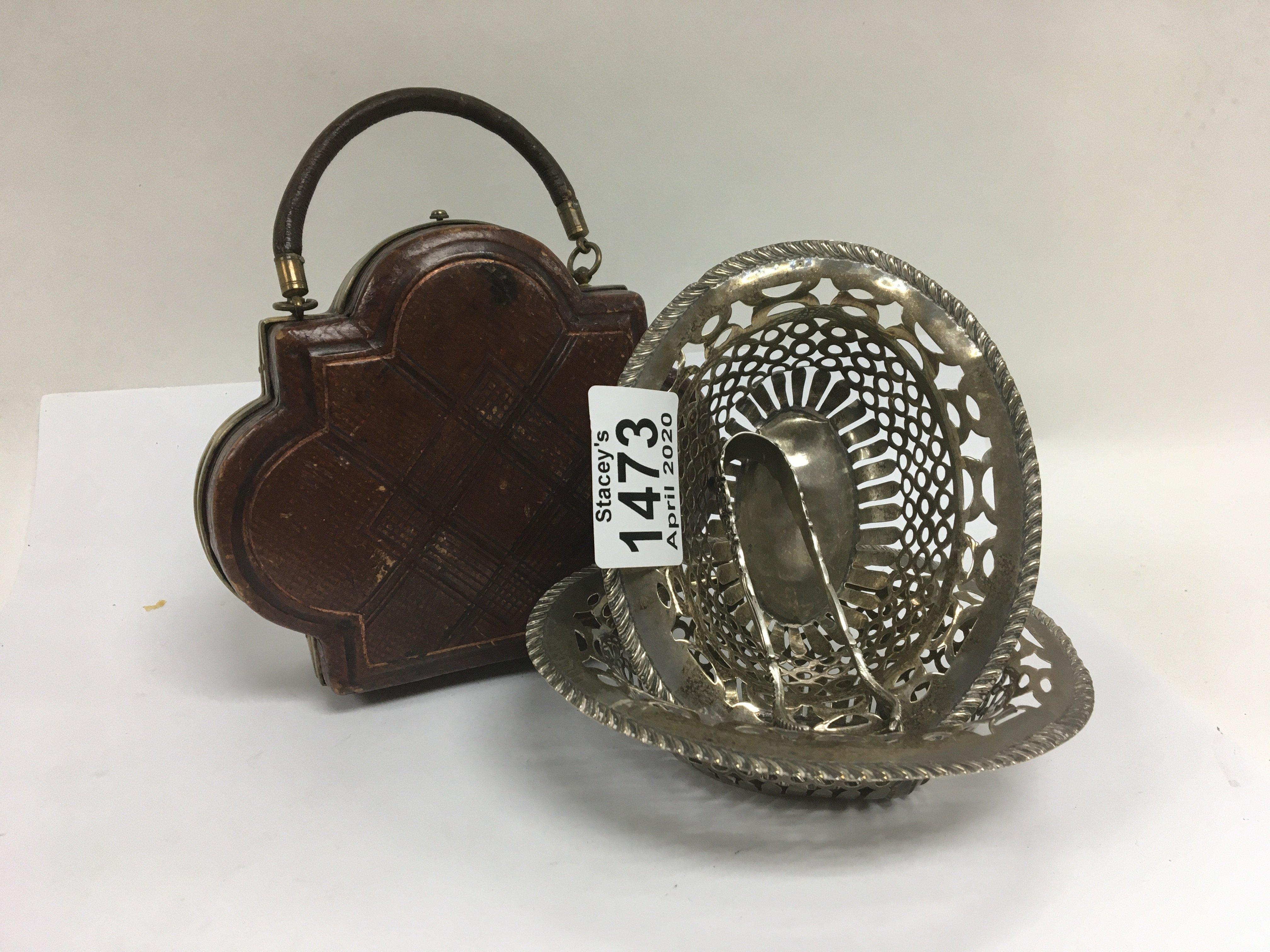 A vintage leather handbag compact, 2 hallmarked silver Bon Bon dishes and a pair of silver sugar