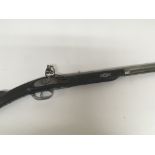 A Flintlock rifle half length stock and steel barr