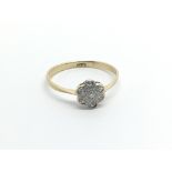 An 18carat gold ring set with a pattern of diamonds ring size.M-N