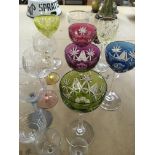 A collection of cut glass drinking glasses and coloured glass various.