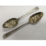 A pair of silver berry spoons, London 1789.