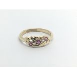 A Vintage 18carat gold ring set with three ruby an