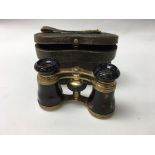 A pair of 19thC tortoiseshell and brass opera glas