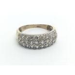 A 9carat gold ring set with three rows of diamonds approximately 0.50 of a carat ring size N-O