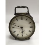 A vintage brass cased clock, approx width 10cm.
