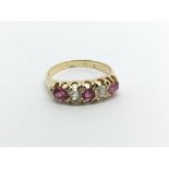 An 18carat gold ring set with ruby and diamonds ri