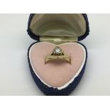 An 18ct gold diamond ring, approx 4g and approx si