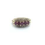 A 9carat gold ring set with ruby and small diamond