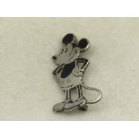 A silver Charles Horner brooch in the form of Mickey Mouse, approx length 3cm.