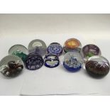 A collection of 10 paperweights