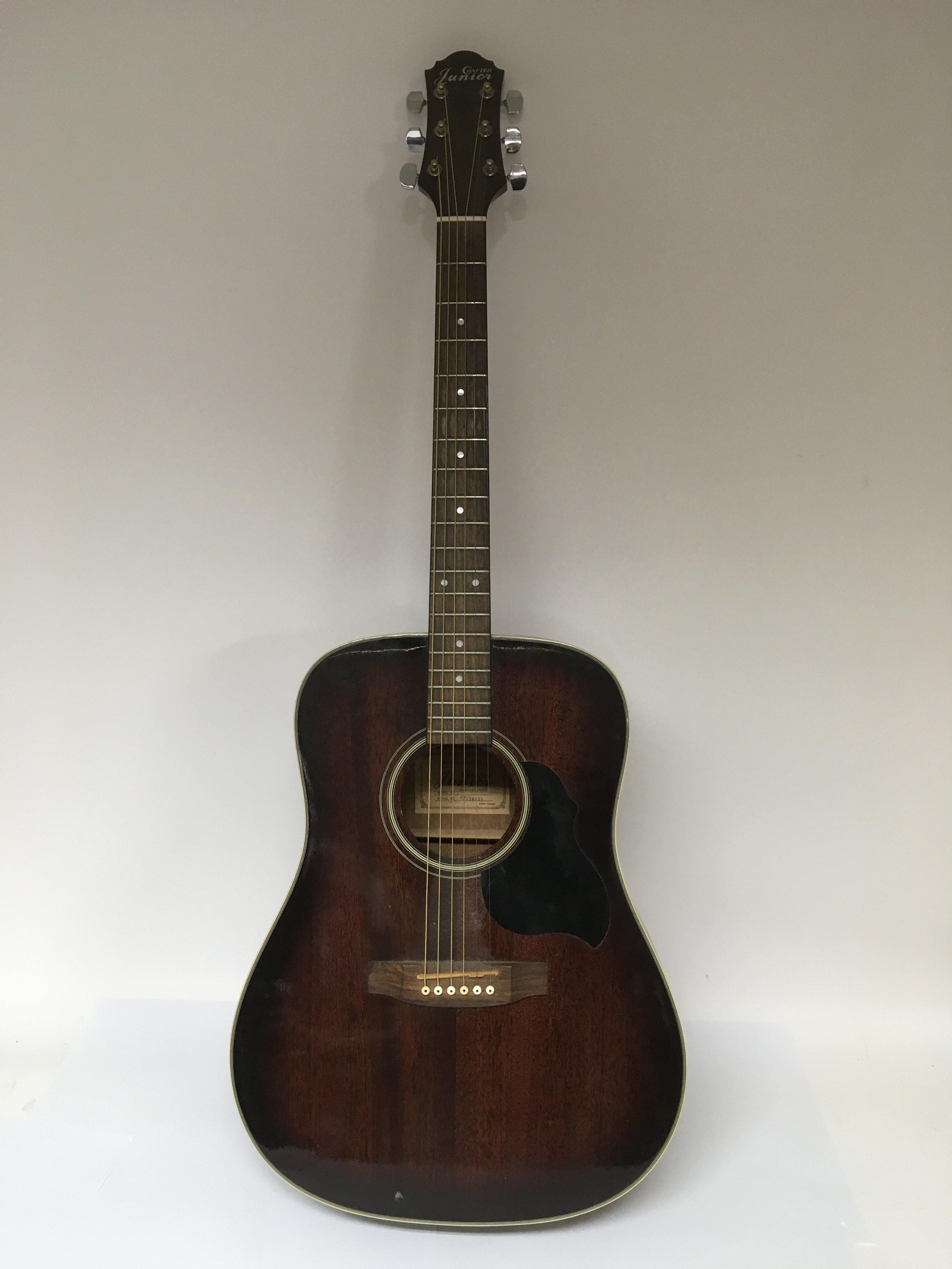 A Crafter Junior JMD 100 acoustic guitar.