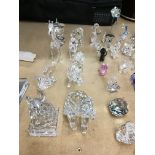 A collection of cut glass animal figures including