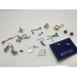 Ten pairs of earrings including silver and mother