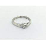 A White gold ring set with a solitaire diamond ring size L-M