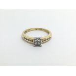 An 18carat gold ring set with princess cut diamond